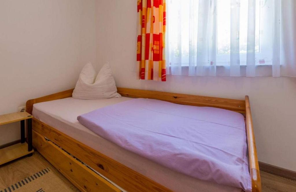 Posteľ alebo postele v izbe v ubytovaní Navy Apartments