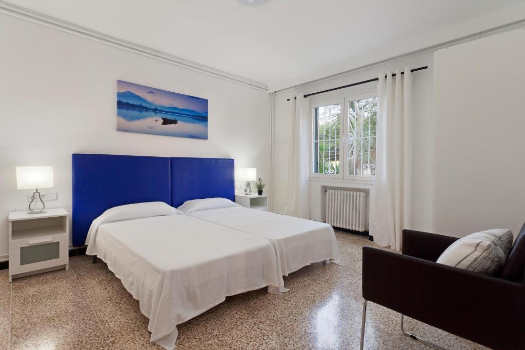 Posteľ alebo postele v izbe v ubytovaní Villa Son Veri Miramar