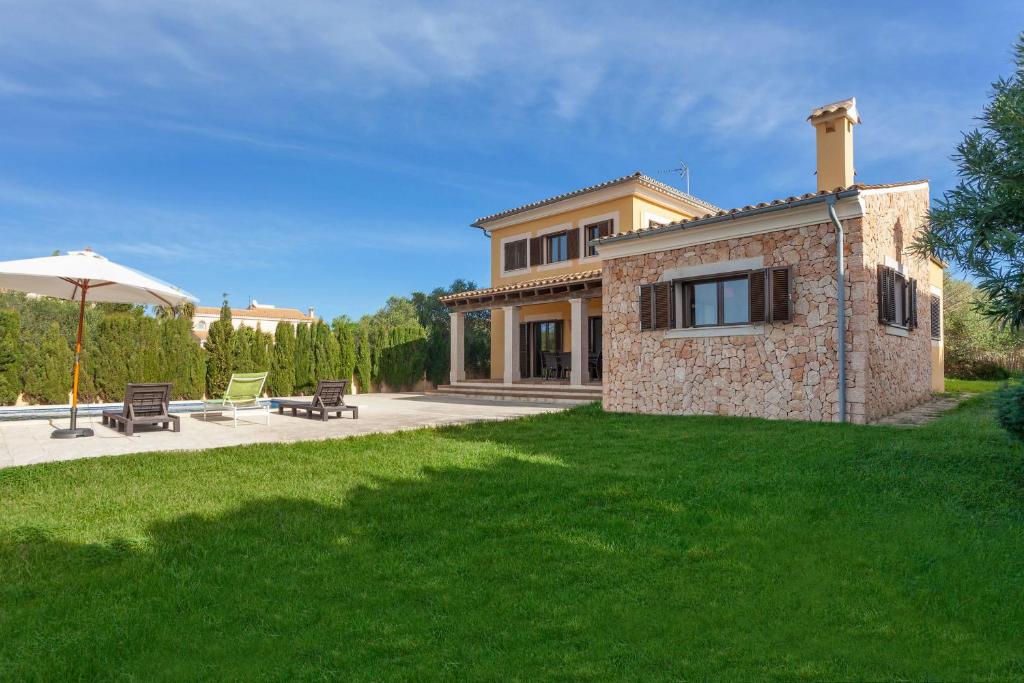 A garden outside Villa Sa Torre