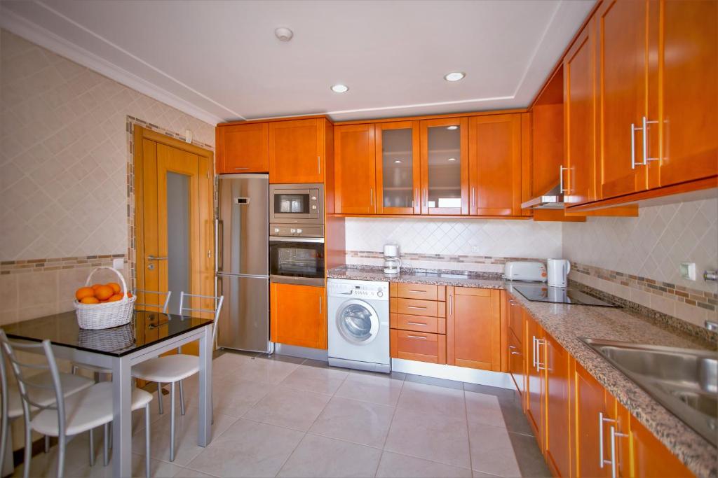 Kuchyň nebo kuchyňský kout v ubytování Villa Albufeira by Atlantic Places