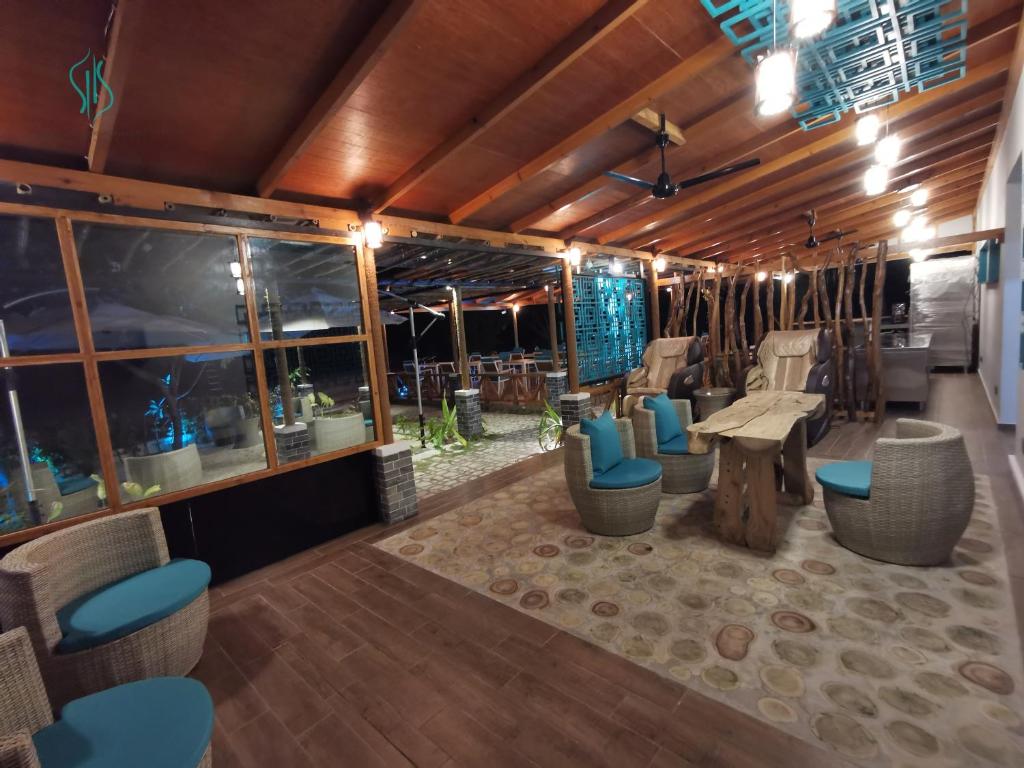Posezení v ubytování Village Hideaways & Spas
