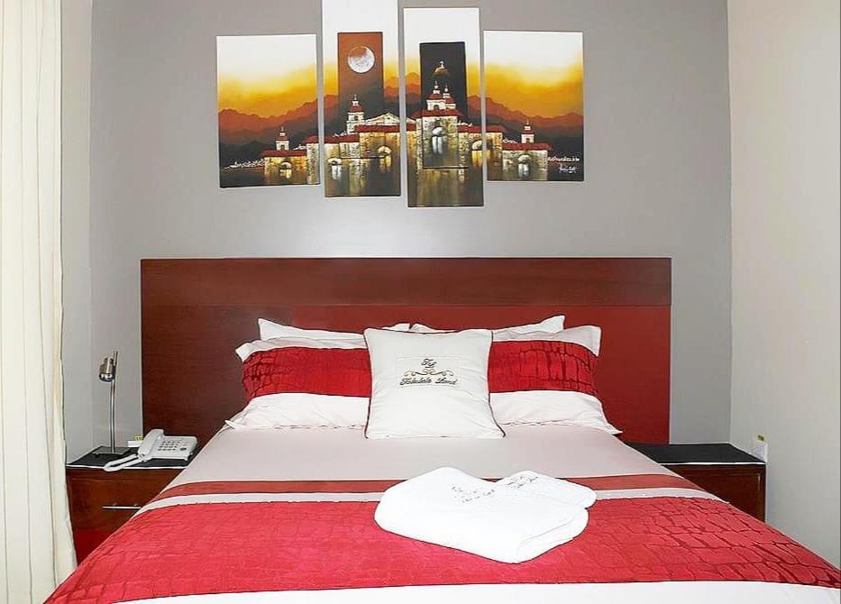 Postel nebo postele na pokoji v ubytování Hotel Tababela Land