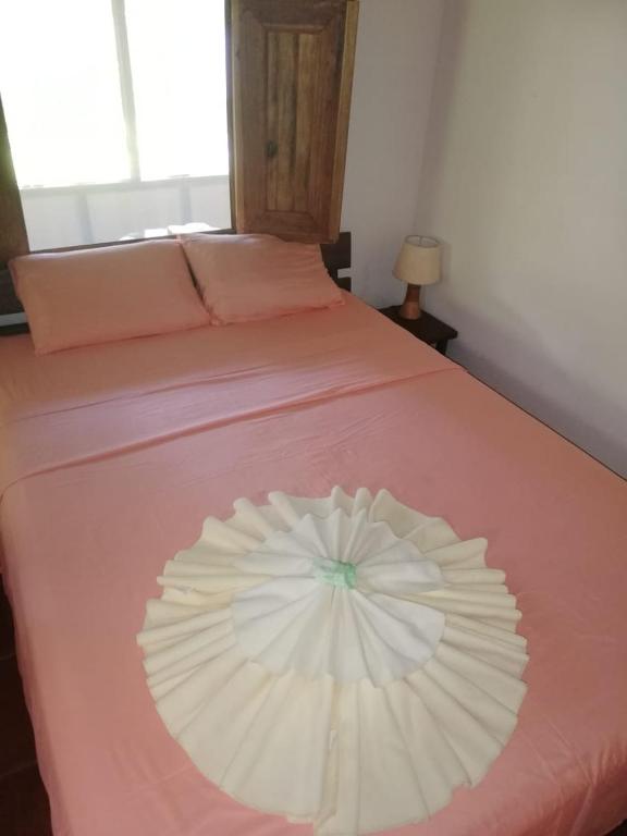 Postel nebo postele na pokoji v ubytování Pochote Lodge