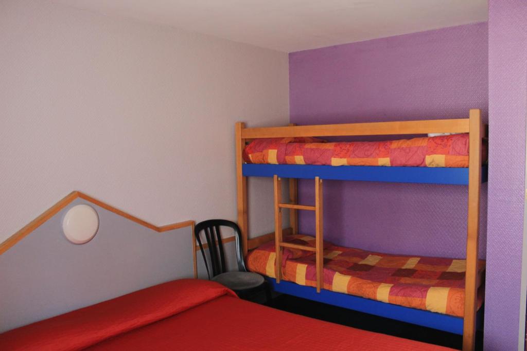 Krevet ili kreveti na kat u jedinici u objektu Fasthotel Vendome