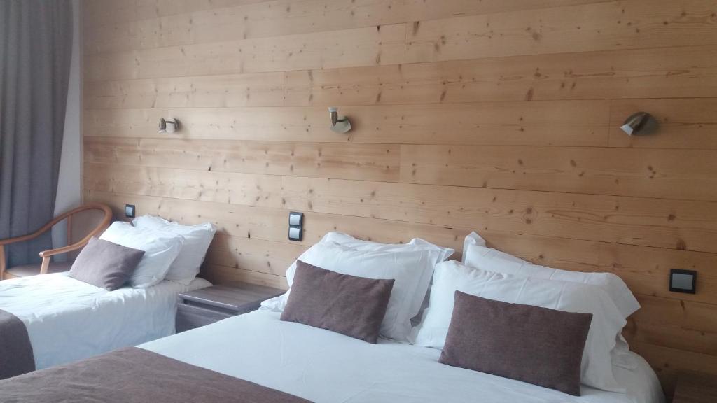 Postel nebo postele na pokoji v ubytování Aiguille Noire