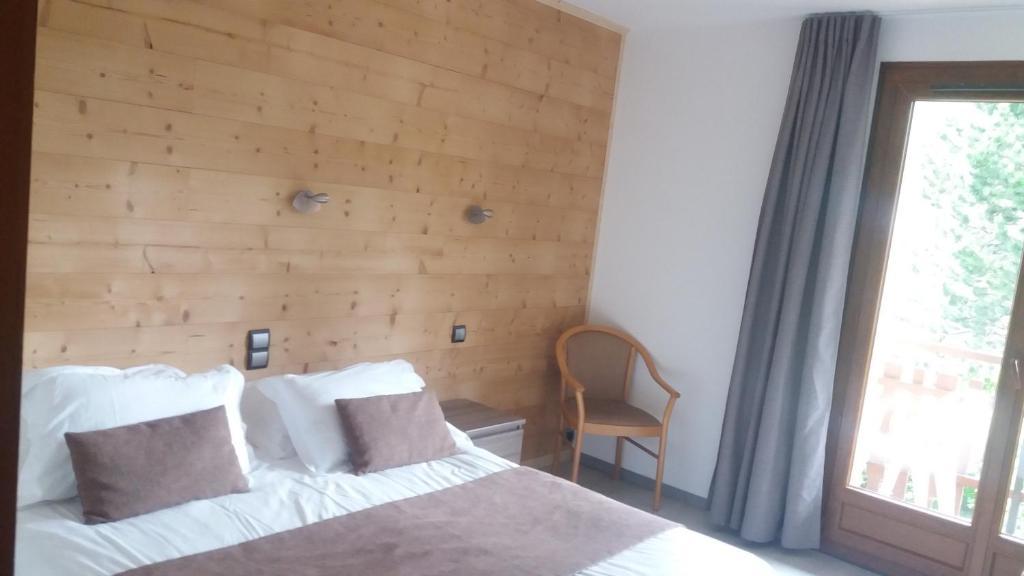 Postel nebo postele na pokoji v ubytování Aiguille Noire