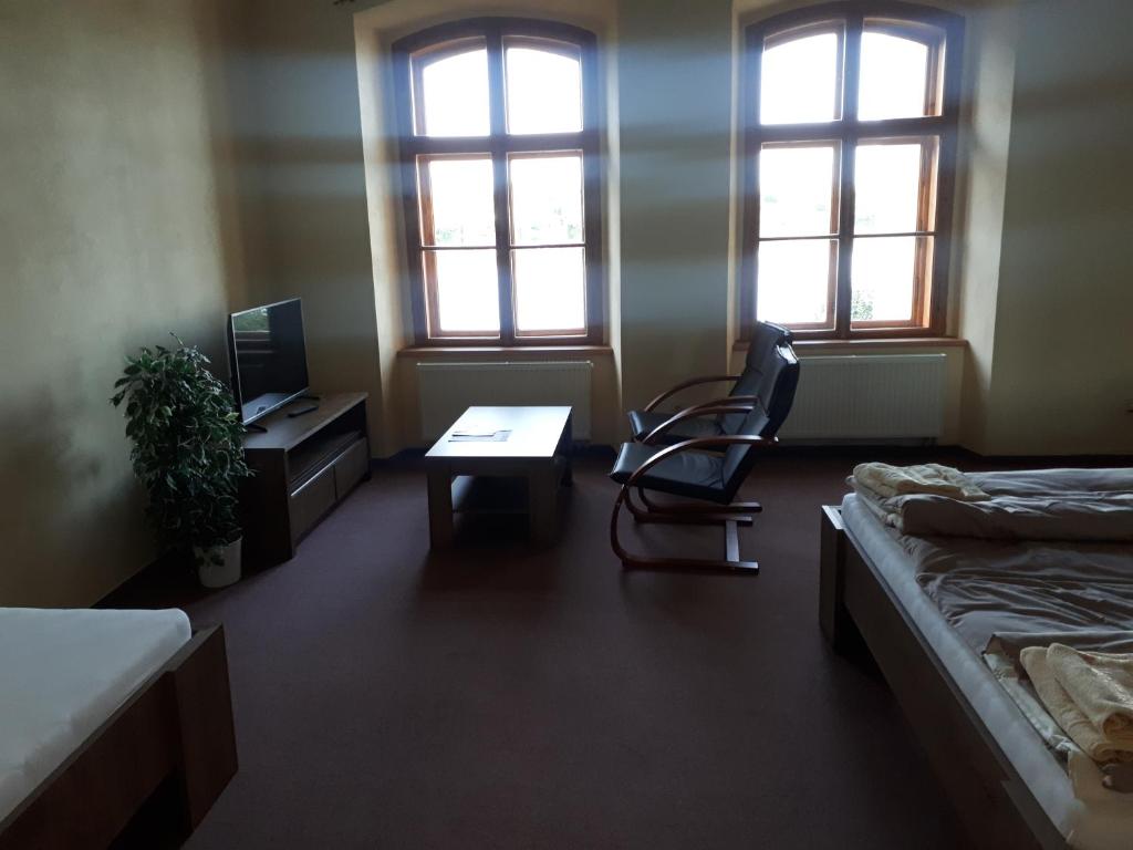Postel nebo postele na pokoji v ubytování Apartmány Šetkova vila