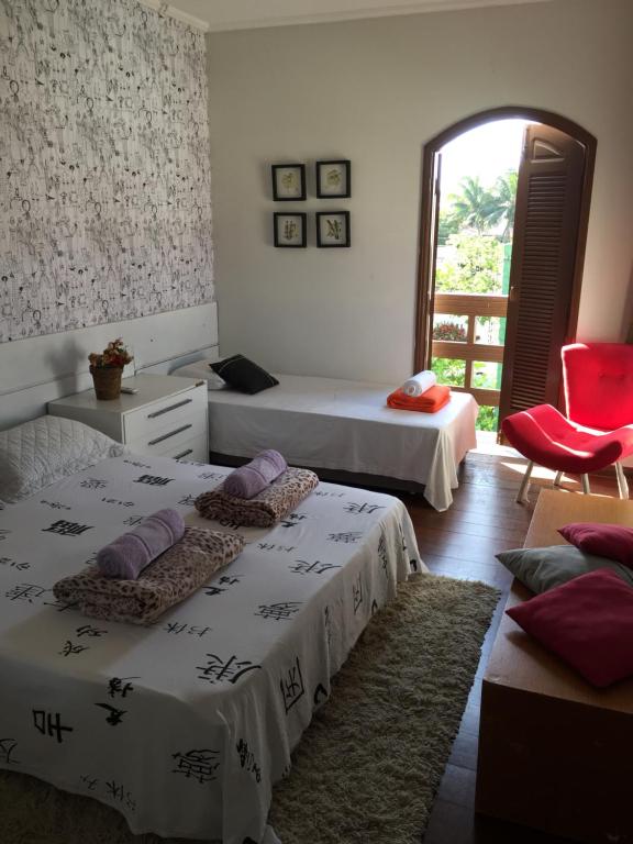 Postel nebo postele na pokoji v ubytování Enjoy Hostel e Pousada
