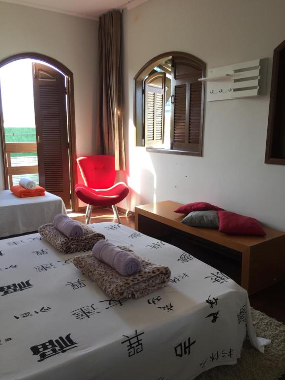 Postel nebo postele na pokoji v ubytování Enjoy Hostel e Pousada