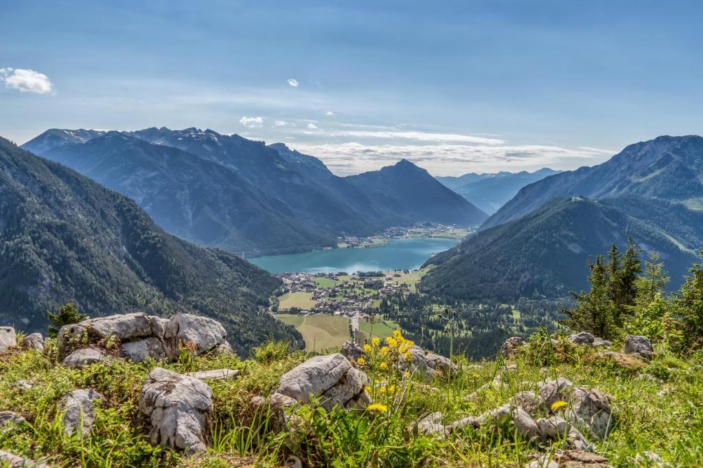 a view of a valley in the mountains at Verwöhnhotel Kristall in Pertisau