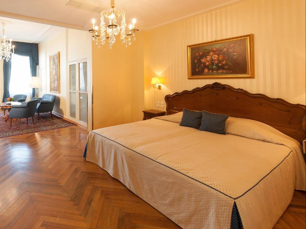 Letto o letti in una camera di Hotel Ambassador