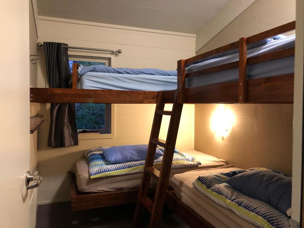 Postel nebo postele na pokoji v ubytování Aneeki Ski Lodge