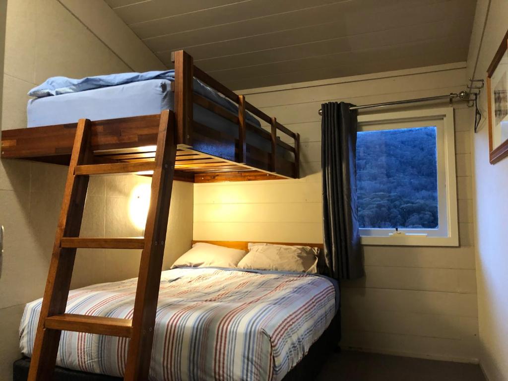 Postel nebo postele na pokoji v ubytování Aneeki Ski Lodge