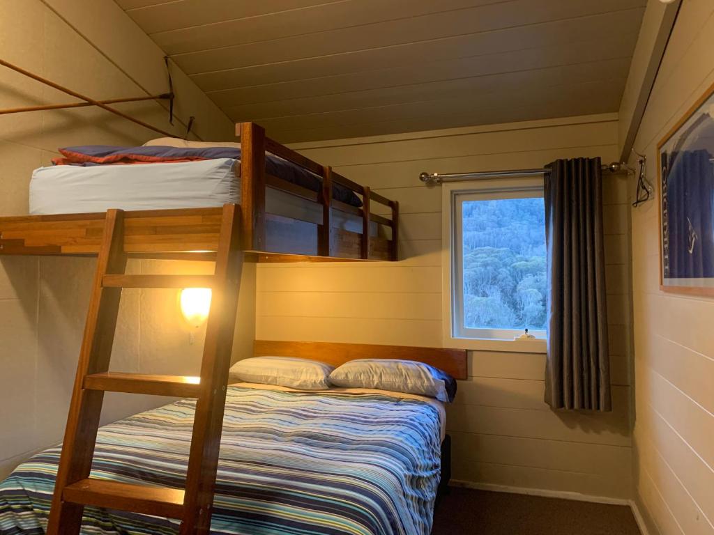 Postel nebo postele na pokoji v ubytování Aneeki Ski Lodge