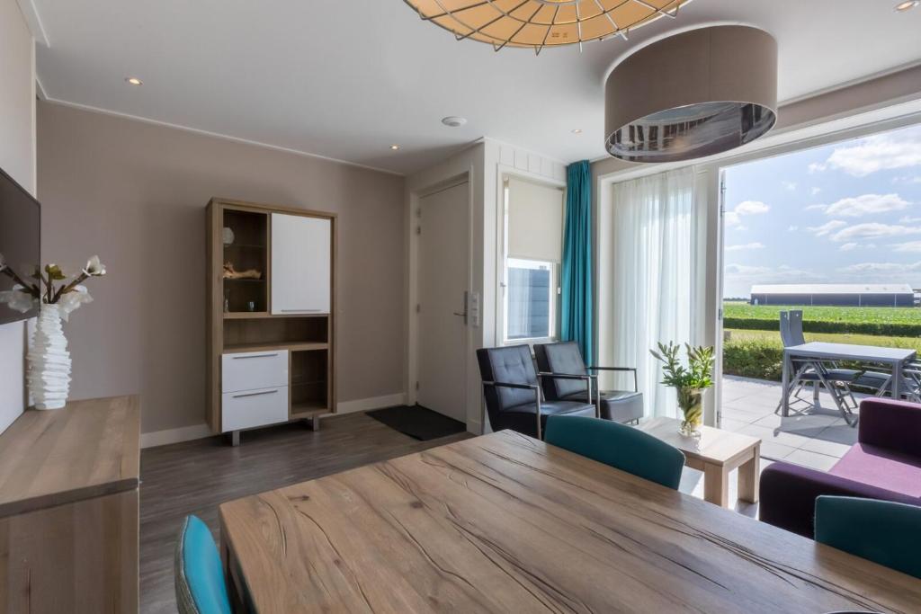 Posezení v ubytování Vakantiewoning - Noordweg 56a Oostkapelle Comfort 4 personen