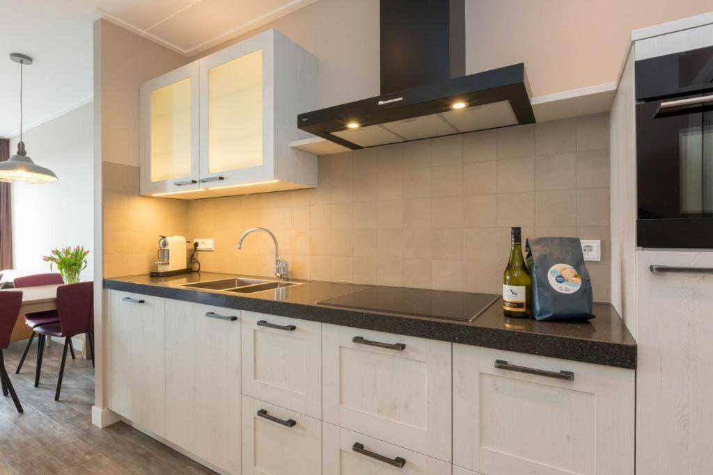 Kuchyň nebo kuchyňský kout v ubytování Vakantiewoning - Noordweg 56a Oostkapelle Comfort 4 personen