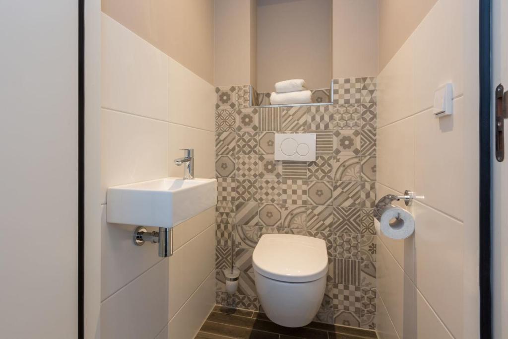 Koupelna v ubytování Vakantiewoning - Noordweg 56a Oostkapelle Comfort 4 personen