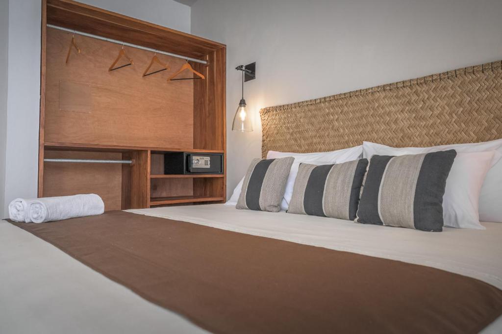 Postel nebo postele na pokoji v ubytování Agam Hotel