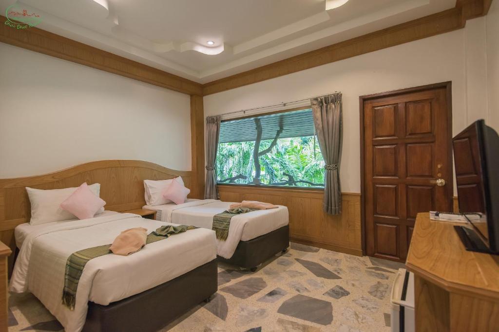 Postel nebo postele na pokoji v ubytování Chai Chet Resort Koh Chang