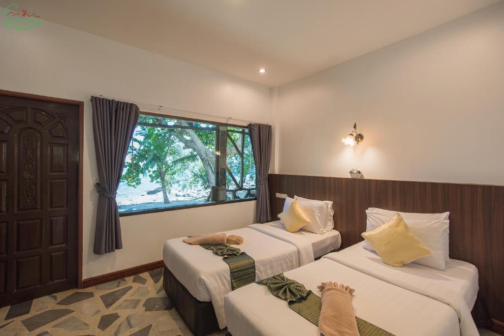 Postel nebo postele na pokoji v ubytování Chai Chet Resort Koh Chang