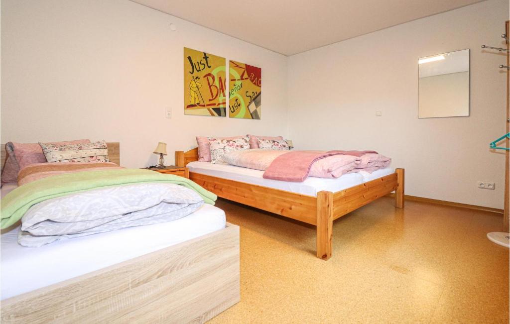 Postel nebo postele na pokoji v ubytování Gemuetliche Ferienwohnung