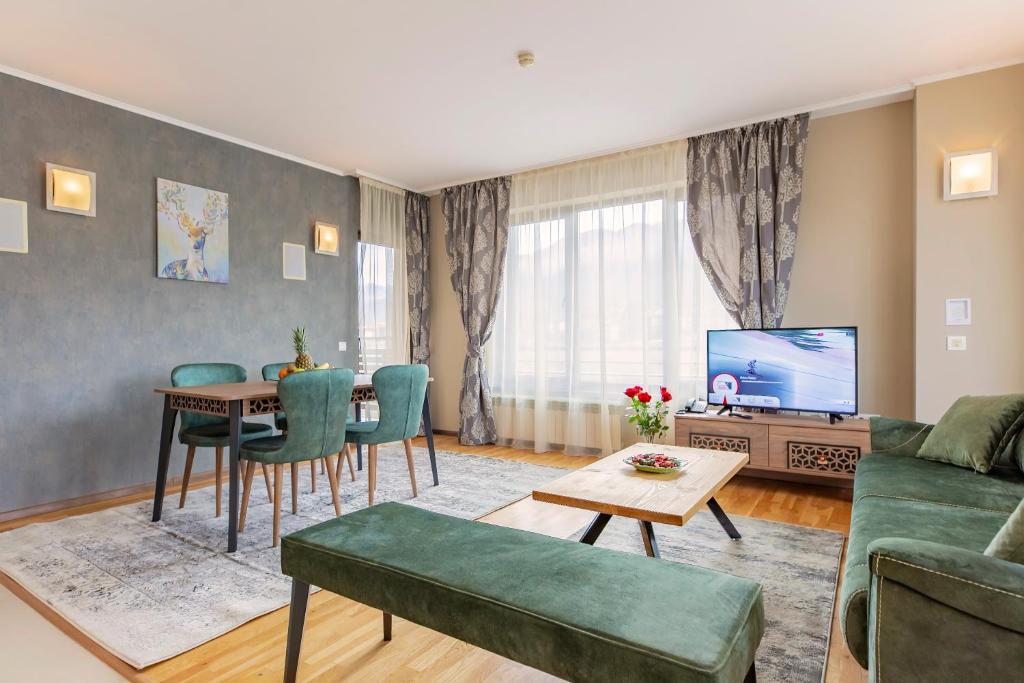 TV a/nebo společenská místnost v ubytování Murite Park Hotel
