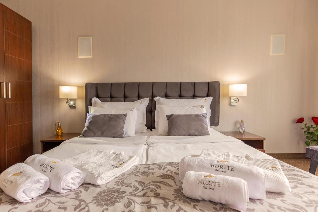 Postel nebo postele na pokoji v ubytování Murite Park Hotel