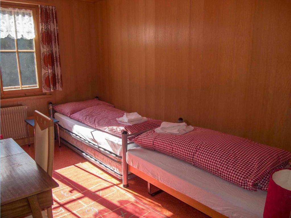 Postel nebo postele na pokoji v ubytování Chalet Sturmfang
