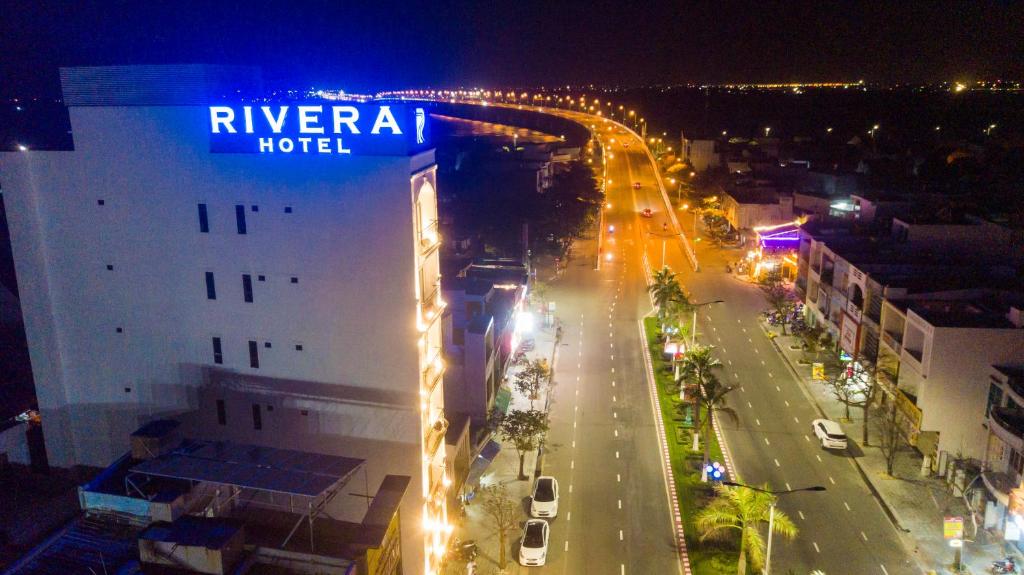 a city street at night with a hotel at Rivera Tuy Hòa Hotel in Tuy Hoa