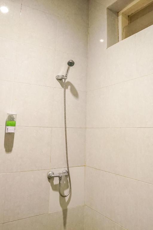 Koupelna v ubytování Airlangga Hotel