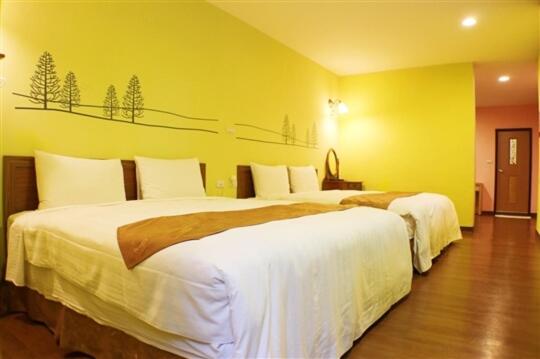 Postel nebo postele na pokoji v ubytování Fungo Hotel