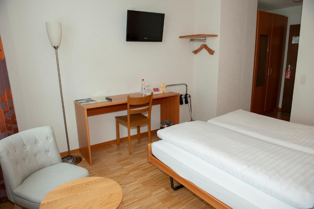 TV a/nebo společenská místnost v ubytování Hotel Sporting