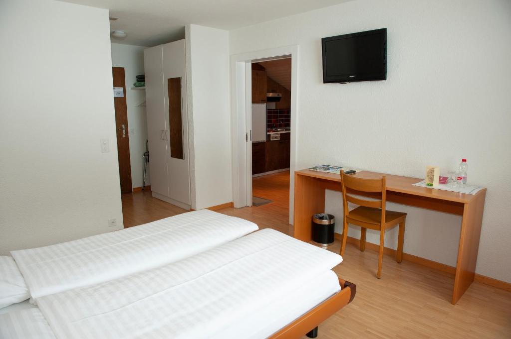 Postel nebo postele na pokoji v ubytování Hotel Sporting