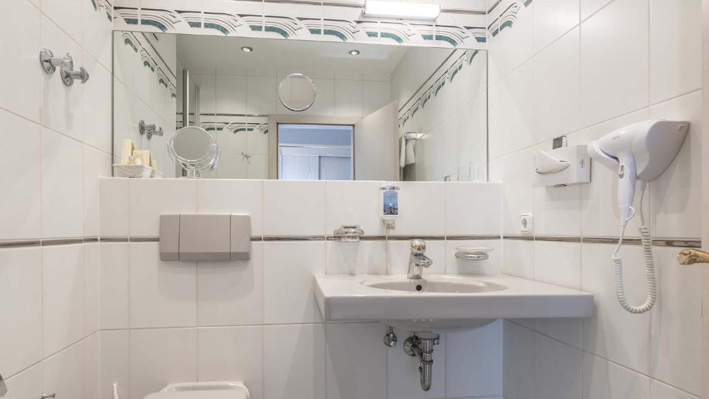 Koupelna v ubytování Hotel am Schlosspark
