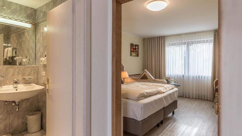 Koupelna v ubytování Hotel am Schlosspark