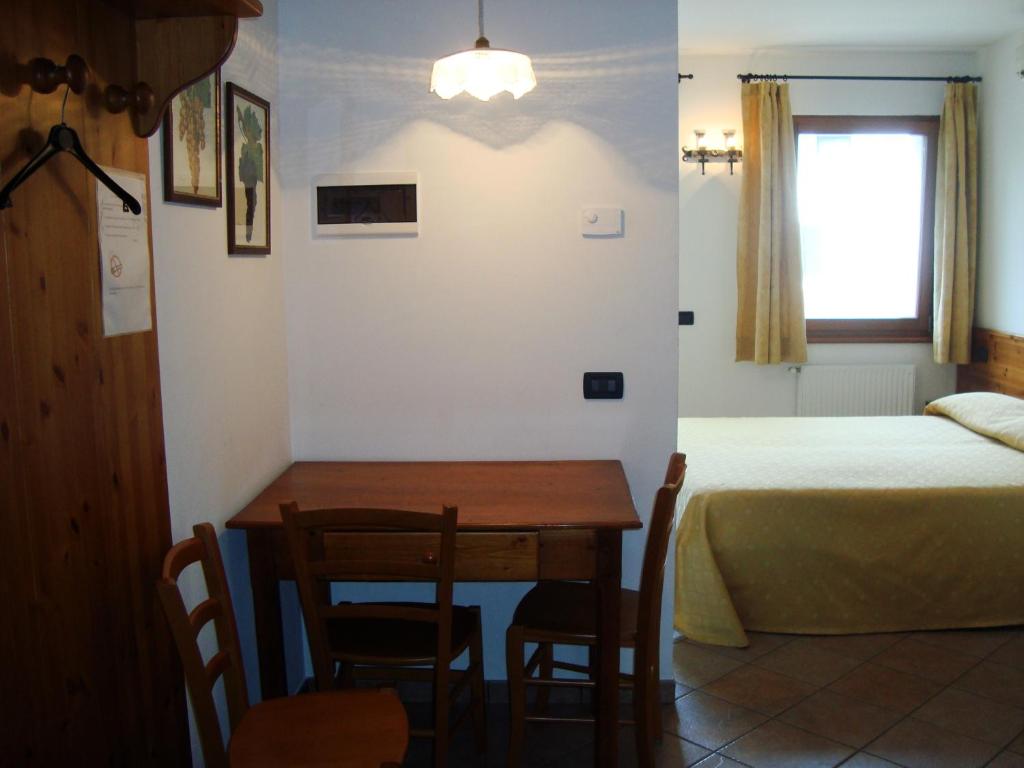 Postel nebo postele na pokoji v ubytování Casa Luis