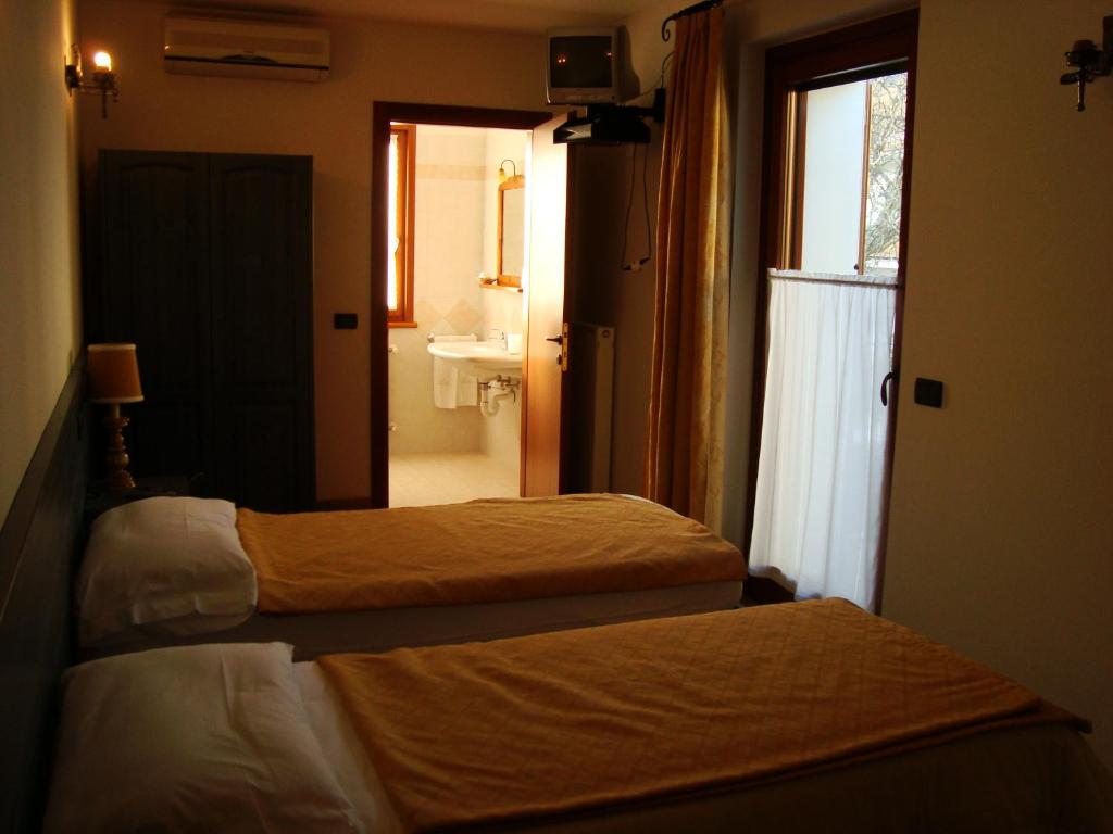 Postel nebo postele na pokoji v ubytování Casa Luis
