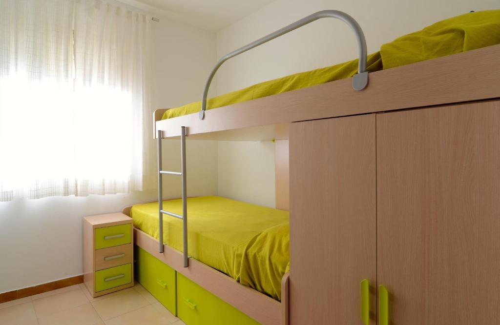 A bed or beds in a room at San Enrique B 2-2