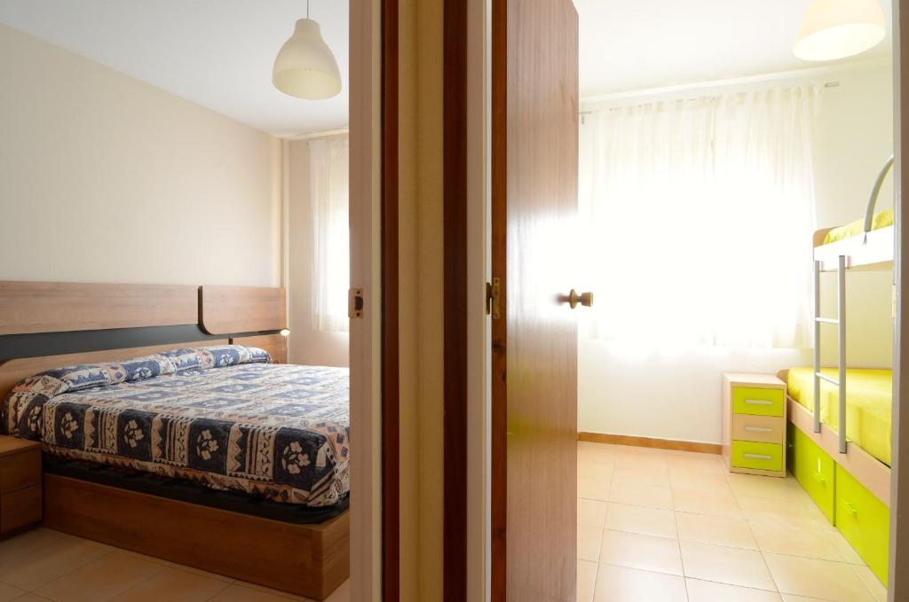 A bed or beds in a room at San Enrique B 2-2