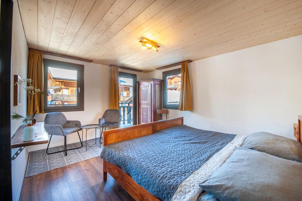 Postel nebo postele na pokoji v ubytování Room's chez BeNi