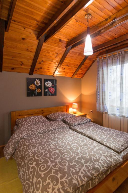 Postel nebo postele na pokoji v ubytování Apartments Andrić