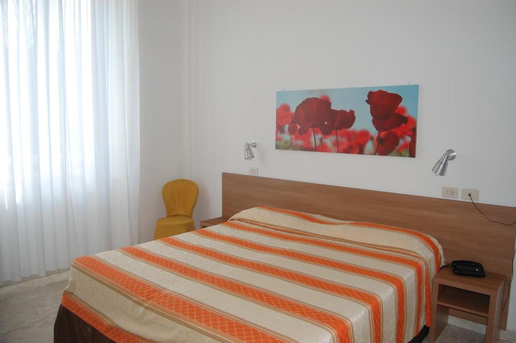 Postel nebo postele na pokoji v ubytování Hotel Derna