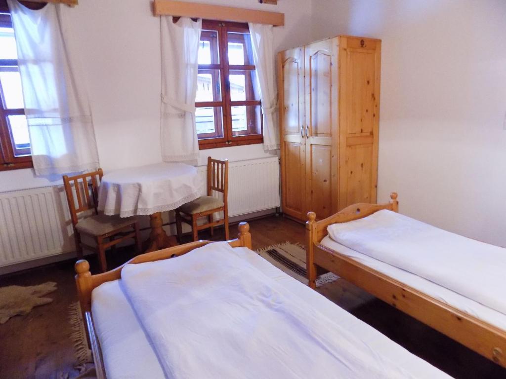 Postel nebo postele na pokoji v ubytování Cserekert, Alszegi Porta