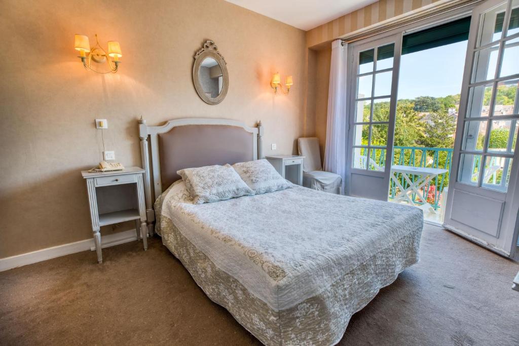 Postel nebo postele na pokoji v ubytování Le Quercy