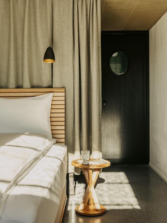 Voodi või voodid majutusasutuse Boutique & Design Hotel Volkshaus Basel toas