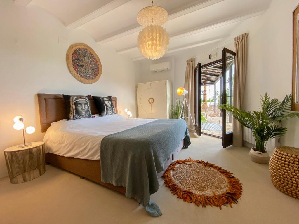 Postel nebo postele na pokoji v ubytování Caballito de Mar Boutique Hotel