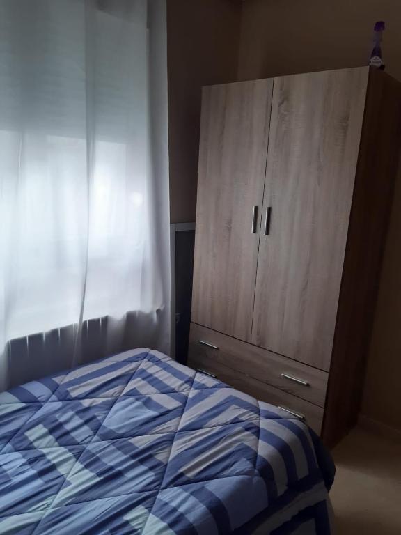 Postel nebo postele na pokoji v ubytování Calle Quevedo, 27 Apartamento. Feria