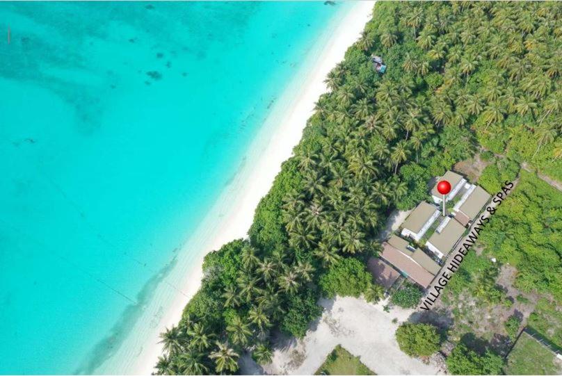 an aerial view of a beach with a red island at Village Hideaways & Spas in Fulhadhoo