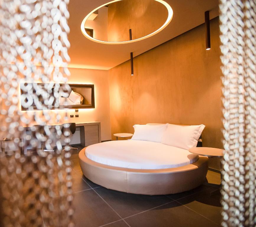 Postel nebo postele na pokoji v ubytování Motel Hotel Charlie