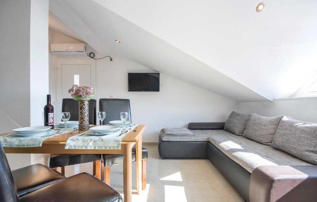 Televízia a/alebo spoločenská miestnosť v ubytovaní Apartment Istria